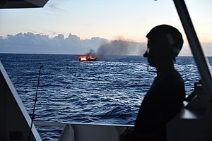 USCGC Joseph Gerczak (WPC 1126) remains on scene to ensure the burning vessel Miss Emma burns - 190917-G-GO214-965.jpg