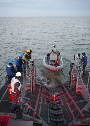 USS Monsoon launches a rigid-hull inflatable boat..jpg