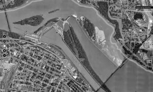 Aerial photograph of the Ohio River, at Louisville, showing the artificial canal to the south, and the (submerge) location of the Falls of the Ohio.jpg