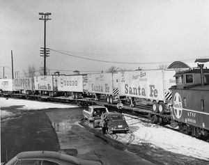 © Photo: Orville Brent The "World's Fastest Train" prepares to leave Chicago on January 16, 1968 with a number of Santa Fe trailers loaded on flatcars.